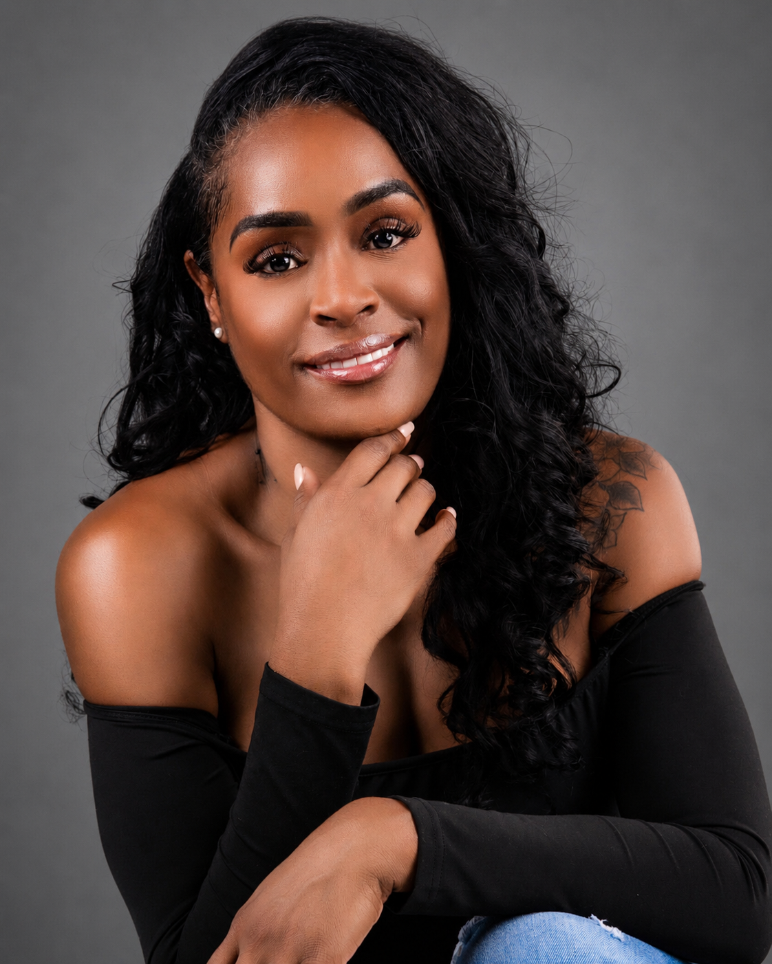Aubree Bravo — white tank, big smile, curly hair